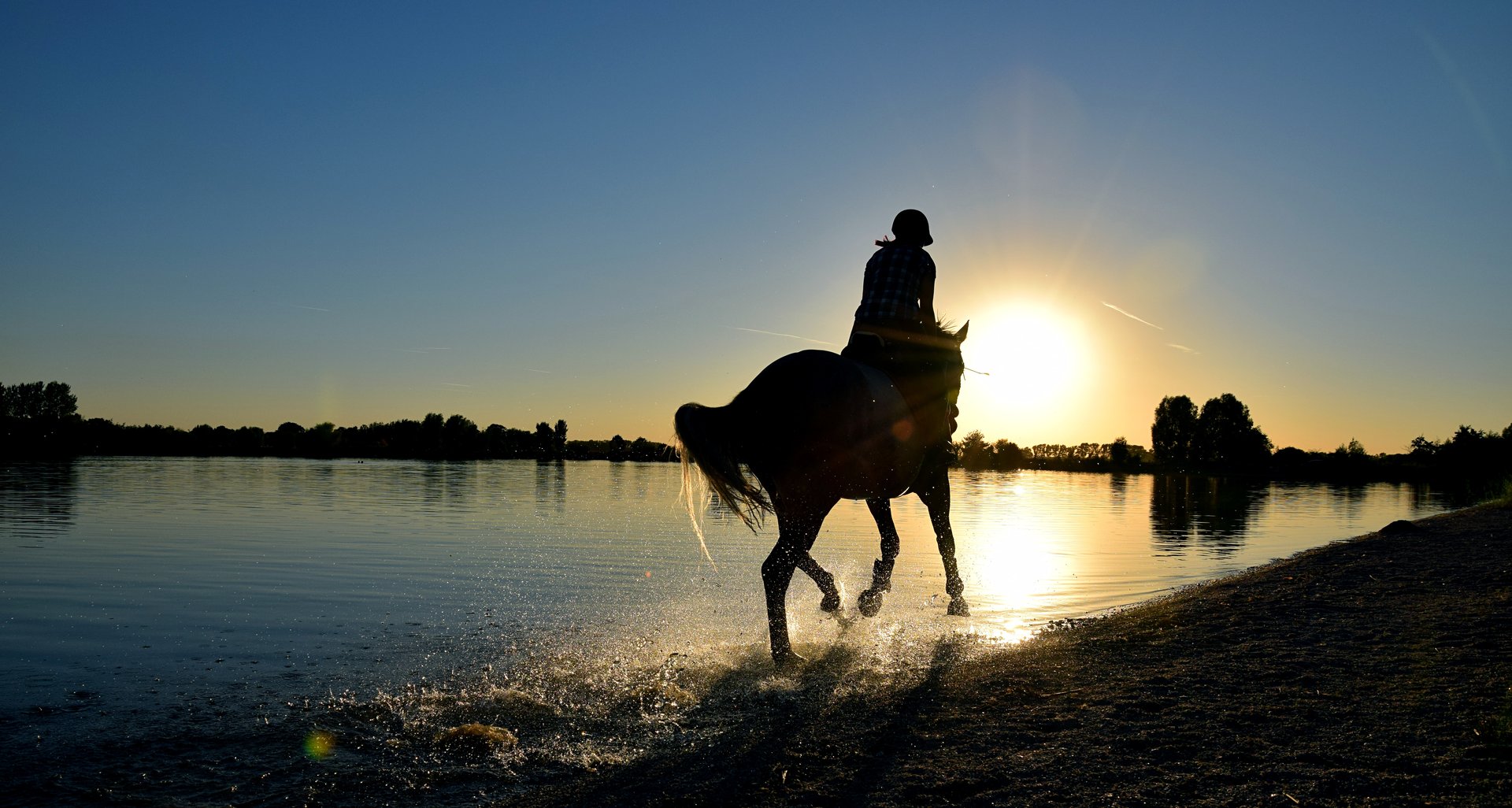 Reiten_an_Strand_Gelting